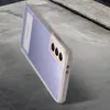 A smartphone case is shown from a diagonal angle on a textured surface. Náhľad obrázku produktu