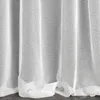 Close-up view of white curtains with a textured pattern, hanging in folds. Náhľad obrázku produktu
