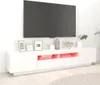 A modern, white TV stand with integrated LED lighting is shown in a room setting, displaying a television above it. Náhľad obrázku produktu