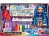 A toy playset featuring a fashion doll and a design studio setup. Produktbild-Vorschau
