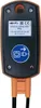 The back of an orange and black electrical adapter plug with labels and a safety symbol. Produktbild-Vorschau