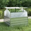 A raised garden bed with a greenhouse cover, filled with plants, sits on a grassy lawn. Anteprima dell’immagine prodotto