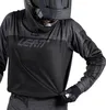 A person wearing a motocross jersey and pants, with a helmet on. Náhľad obrázku produktu