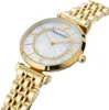 A close-up, angled shot of a gold Emporio Armani women's watch with a white mother-of-pearl dial and diamond accents. Produktbild-Vorschau