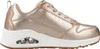 A side view of a single rose gold sneaker against a white background. Voir les images du produit