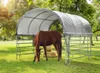 A brown horse grazes under a gray canopy shelter in a grassy field. Produktbild-Vorschau