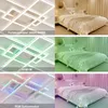A collage showing a modern LED ceiling light in different color modes and a bedroom setting. Anteprima dell’immagine prodotto