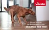 A wet dog is shaking water off itself on a wooden floor, with a Vileda logo and text overlay. Náhľad obrázku produktu