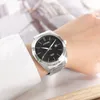 A person wearing a white shirt and a Citizen watch. Náhľad obrázku produktu