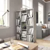 A living room scene with a bookshelf room divider, a couch, and a coffee table. Náhľad obrázku produktu