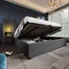 A bedroom scene with a bed that has storage underneath, a nightstand with a lamp and USB port, and a large window. Anteprima dell’immagine prodotto