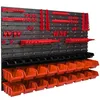 A wall-mounted storage system with various red tool holders and orange storage bins. Anteprima dell’immagine prodotto
