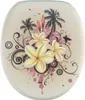 A toilet seat with a tropical design featuring palm trees, plumeria flowers, and a surfer. Náhled obrázku produktu