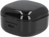 A black charging case for earbuds is shown from a slightly elevated angle. Podgląd zdjęcia produktu