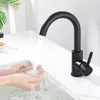 Hands washing under a black faucet in a sink. Produktbild-Vorschau