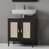 A bathroom vanity with a sink and faucet against a tiled wall. Produktbild-Vorschau