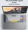 A laptop with a keyboard placed on top of it, displaying a mountain landscape on the laptop screen. Produktbild-Vorschau