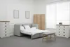Selbstklebende Teppichfliesen in Anthrazit. In einem Gästezimmer verlegt.  Podgląd zdjęcia produktu