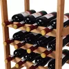 A close-up view of a wooden wine rack filled with dark glass wine bottles. Náhled obrázku produktu