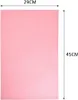 A pink mat with a honeycomb pattern, with dimensions indicated by text. Produktbild-Vorschau