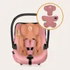 A pink baby car seat with an inset showing additional padding inserts. Náhled obrázku produktu