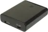 A black battery holder with a USB port and an on-off switch. Podgląd zdjęcia produktu