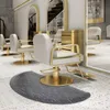 A salon interior with styling chairs and a floor mat. Náhled obrázku produktu