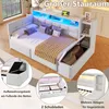 A white daybed with integrated storage and LED lighting, shown in a bedroom setting with decorative pillows and a throw blanket. Multiple inset images highlight storage features and drawers. Produktbild-Vorschau