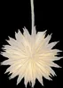 A white paper star lantern hangs against a black background. Podgląd zdjęcia produktu