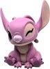 A pink figurine of the character Angel from Lilo & Stitch is sitting down and winking. Anteprima dell’immagine prodotto