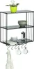 A black metal wall shelf with three tiers, holding a potted plant, bowls, a French press, and mugs. Produktbild-Vorschau