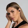 A woman wearing black earbuds. Anteprima dell’immagine prodotto