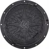 A black manhole cover with a compass rose design. Produktbild-Vorschau