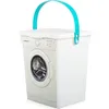 A white laundry basket with a turquoise handle, designed to resemble a washing machine. Produktbild-Vorschau