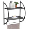 A bathroom shelf with toiletries and a towel. Produktbild-Vorschau