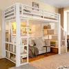 A loft bed with integrated storage and a sofa underneath, set in a bedroom. Náhled obrázku produktu