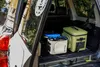 The open trunk of a car with two coolers inside. Anteprima dell’immagine prodotto
