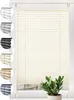 A close-up view of a cream-colored pleated blind installed on a window, with a small potted plant in the foreground. Produktbild-Vorschau