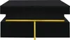 A black coffee table with a gold accent bar. Produktbild-Vorschau