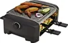 A raclette grill with food cooking on it. Produktbild-Vorschau