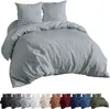 A grey duvet cover and pillow set is shown on a white background. Below the main product image, there is a row of smaller images showing the same bedding set in various colors. Produktbild-Vorschau