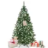 A decorated Christmas tree with presents at its base. Voir les images du produit