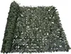 A rolled-up privacy screen made of artificial leaves. Náhled obrázku produktu