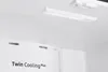 Interior view of a refrigerator, showing the light and a label. Produktbild-Vorschau