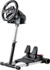 A racing wheel stand with pedals, shown against a white background. Náhled obrázku produktu