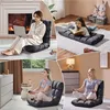 Collage of four images showing a floor chair being used in different settings: by a fireplace, for reading, for gaming, and for meditation. Podgląd zdjęcia produktu