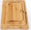A set of three nested bamboo cutting boards. Produktbild-Vorschau