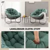 Two green accent chairs with thick cushions are shown in a living room setting, with a small side table between them. Below are close-up shots of the chair's cushion. Produktbild-Vorschau