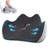 A close-up of an ergonomic seat cushion with blue arrows indicating airflow, and a smaller inset image of a person sitting on a chair with the cushion. Produktbild-Vorschau