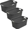 Three dark gray laundry baskets are stacked diagonally on a white background. Produktbild-Vorschau